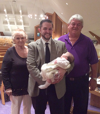 Justin, his father Jerry, and Grandma Liz at Trevor's Baptism - Thumbnail